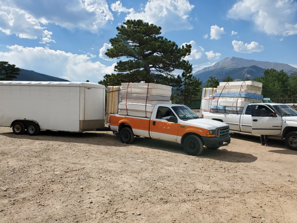 Fleet of mattress recycling trucks